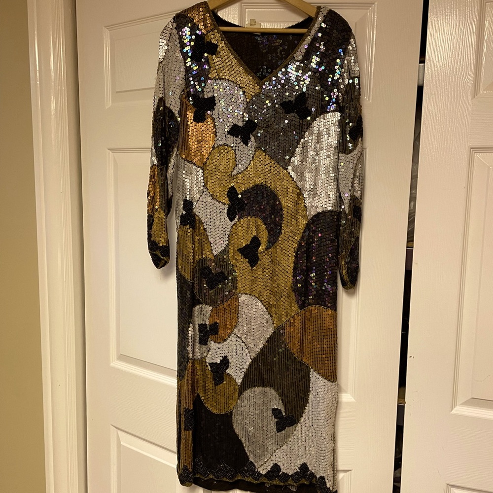 Sequined dress with silk lining